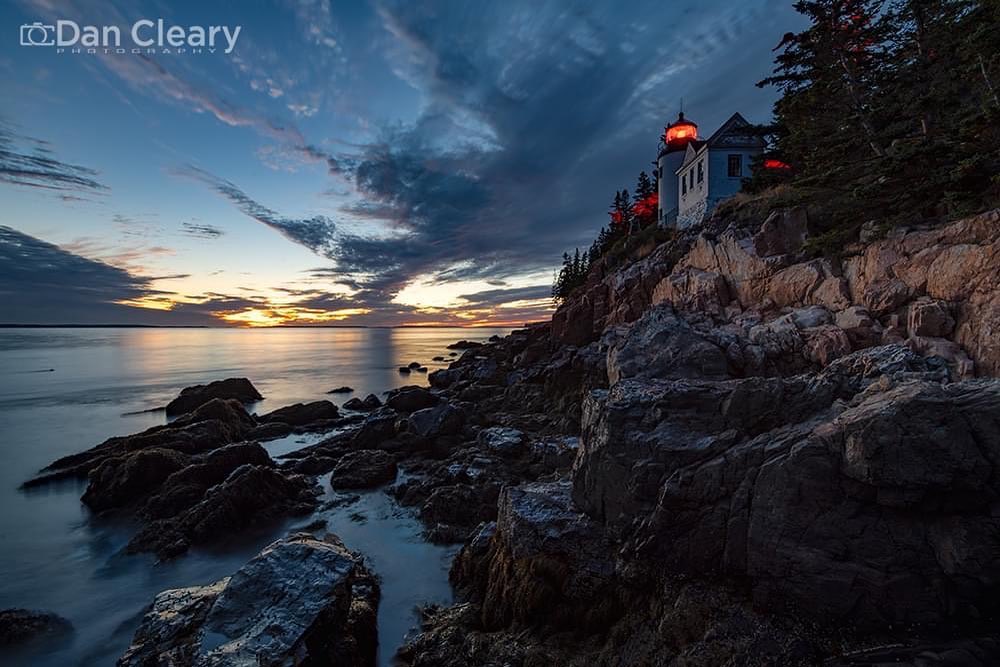 Bass Harbor Head Lighthouse is a historic lighthouse located in the Acadia National Park in Maine. Built in 1858, it is the only lighthouse on Mount Desert Island. It is situated on the southern side of the island overlooking Bass Harbor Bar and the Atlantic Ocean. The need for the lighthouse became clear as many mariners were struggling to navigate into Bass Harbor. In 1855, the lighthouse inspector, W.B. Franklin, reported that a lighthouse on Bass Harbor Head was truly a necessity. On August 18, 1856, Congress allotted the funds necessary to purchase land and establish a light station on Bass Harbor Head.

The lighthouse was built in 1858 and went into service that year. It is a white, cylindrical brick tower with a black lantern room. It stands 33 feet tall and its focal height is 56 feet. The lighthouse is currently equipped with a a Henry-Lepaute fourth-order lens which features an occulting red flash every 4 seconds. The light has a range of 13 nautical miles.  It is currently an active navigational aid owned by the National Park Service. The Coast Guard transferred ownership to the NPS in 2017.  #bassharborlighthouse #bassharbor #acadianationalpark #maine #lighthousesofmaine #