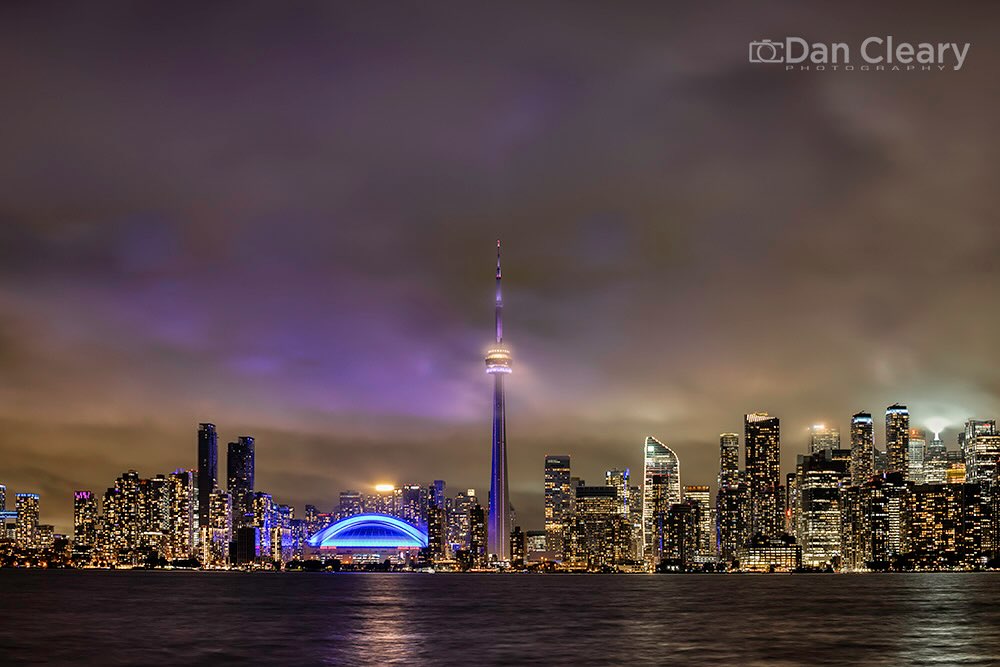 In the 1970s, Toronto experienced major economic growth and surpassed Montreal to become the largest city in Canada. Many international and domestic businesses relocated to Toronto and created massive new skyscrapers downtown. All of Canada’s Big Five banks constructed skyscrapers beginning in the late 1960s up until the early 1990s.

Today downtown Toronto contains dozens of notable skyscrapers. The area’s First Canadian Place is the tallest building in Canada at a height of 298 metres (978 feet). The CN Tower, once the tallest free-standing structure in the world, remains the tallest such structure in the Americas, standing at 553.33 metres (1,815 ft., 5 inches). Other notable buildings include Scotia Plaza, TD Centre, Commerce Court, the Royal Bank Plaza, The Bay’s flagship store, and the Fairmont Royal York Hotel.

The area is made up of Canada’s largest concentration of skyscrapers and businesses that form Toronto’s skyline. Since 2022, downtown Toronto has the second most skyscrapers in North America exceeding 200 metres (656 ft) in height, behind only Midtown Manhattan, New York City.  #toronto #torontolife #torontoskyline #canada🇨🇦